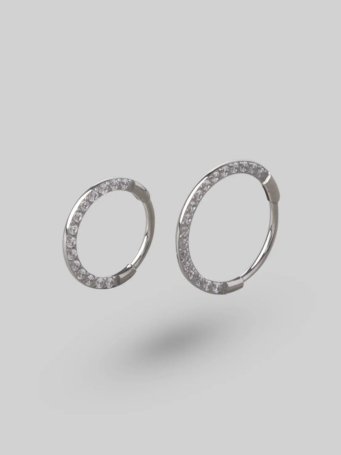 Clicker Pin Segment Ring Front Face Clear CZ in Silver - Titanium - Camden Body Jewellery