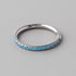 Hinged Segment Ring Aqua CZ Side Face in Silver - Titanium - Camden Body Jewellery