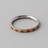 Hinged Segment Ring Orange Opal & Black CZ Side Face in Silver - Titanium - Camden Body Jewellery