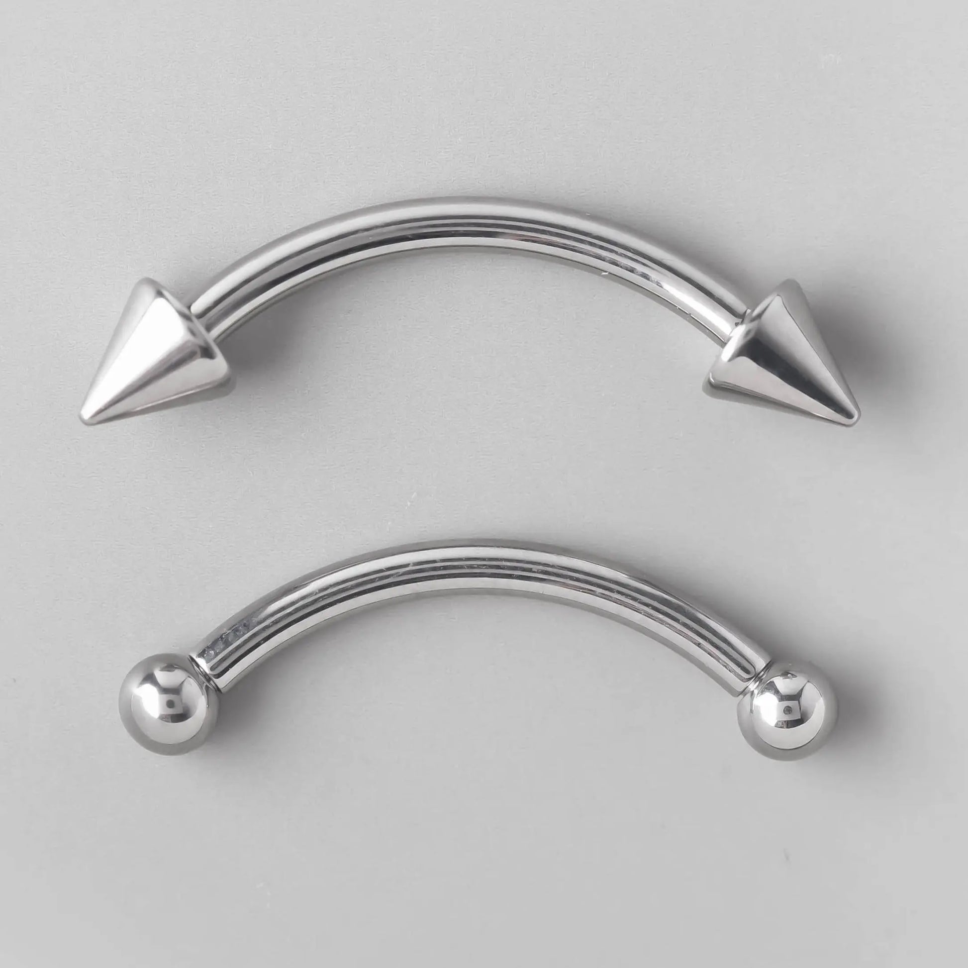 Curved Barbell with Spikes - Titanium - Camden Body Jewellery