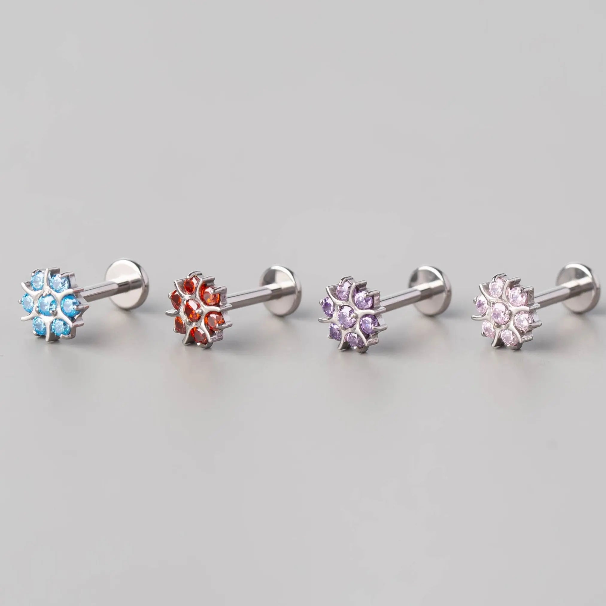 CZ Paved Flower Labret in Red - Titanium - Camden Body Jewellery