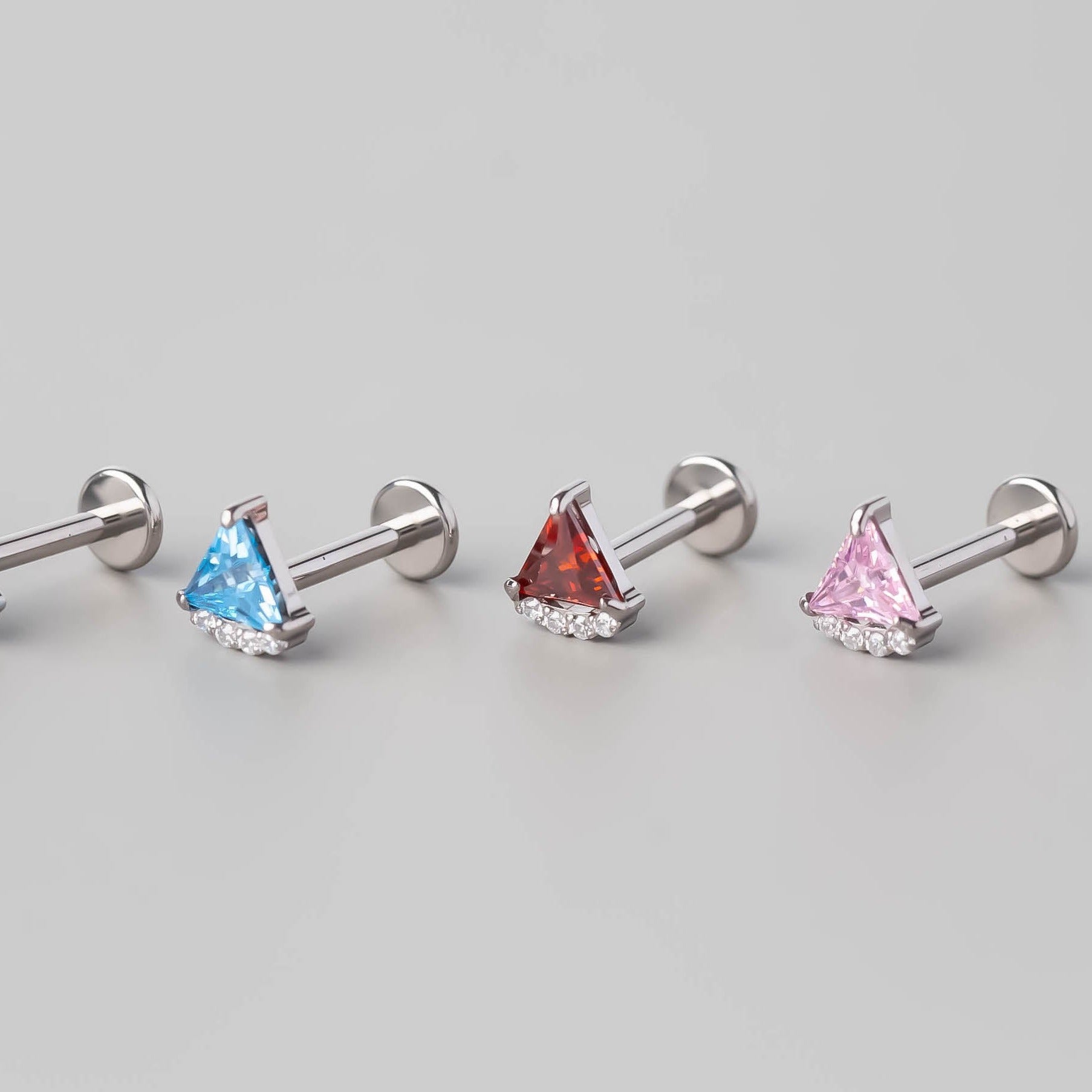 Quadruple CZ Triangle Set Labret in Pink - Titanium - Camden Body Jewellery