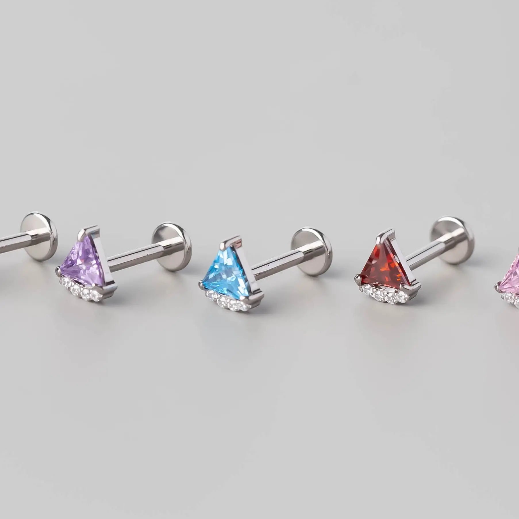 Quadruple CZ Triangle Set Labret in Red - Titanium - Camden Body Jewellery