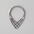 Silver earring on a gray background